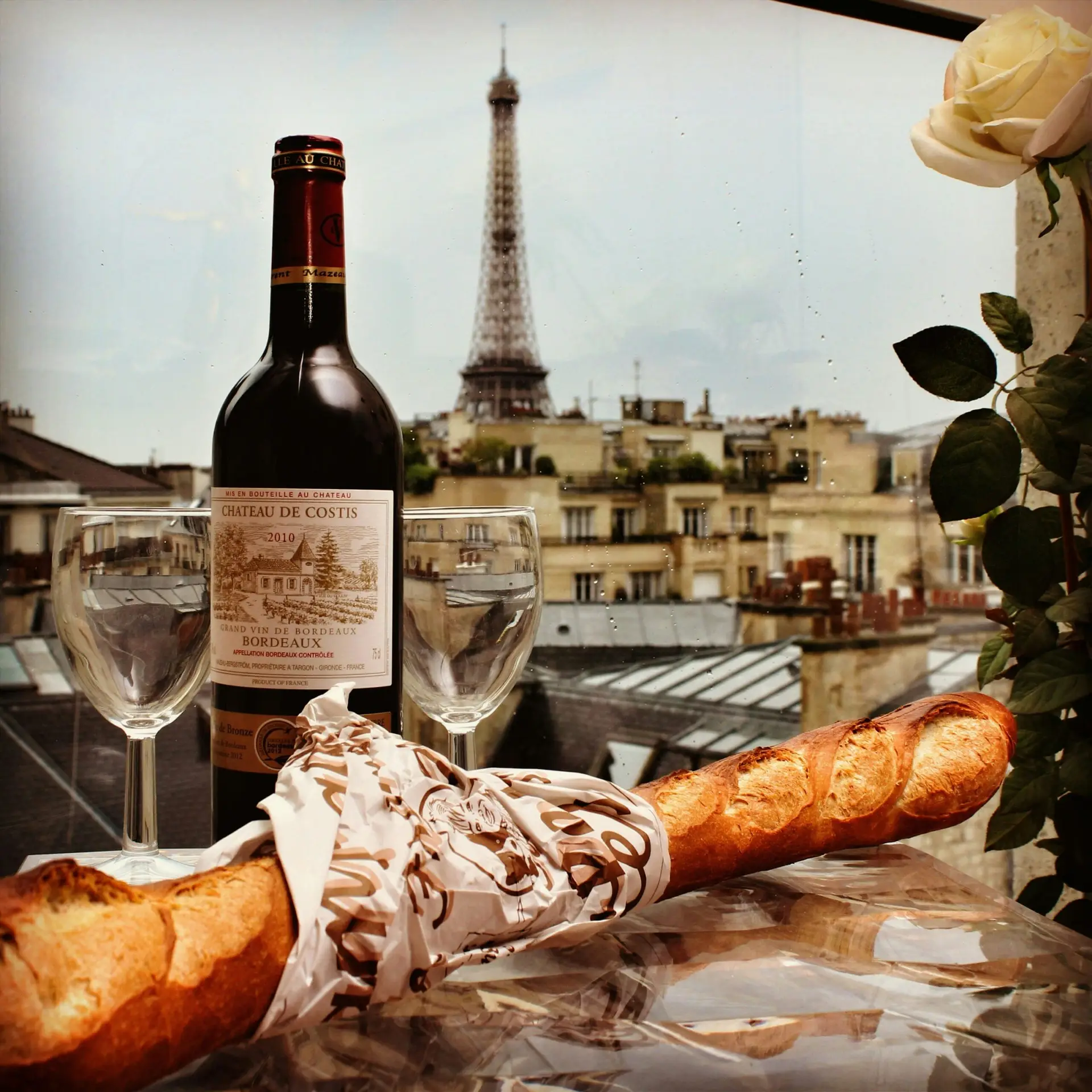 French baguette, wine and Eiffel Tower